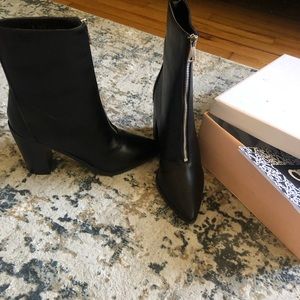 Brand new, black, never worn boots.